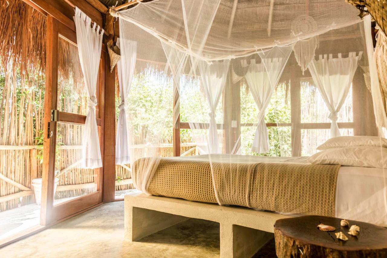 Mamasan Treehouses & Cabins ตูลุม ภายนอก รูปภาพ