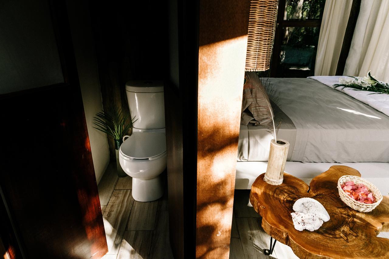 Mamasan Treehouses & Cabins ตูลุม ภายนอก รูปภาพ