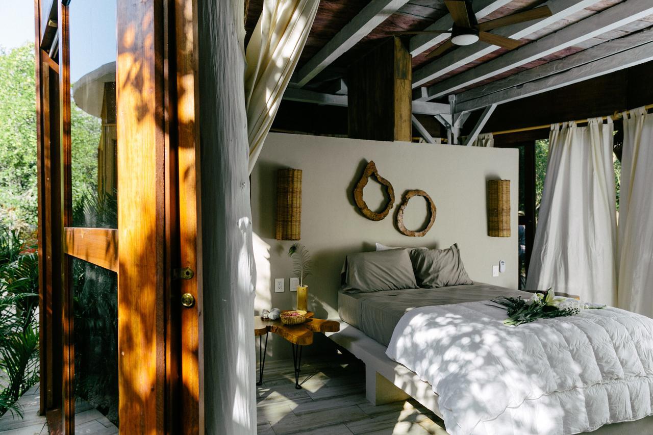 Mamasan Treehouses & Cabins ตูลุม ภายนอก รูปภาพ