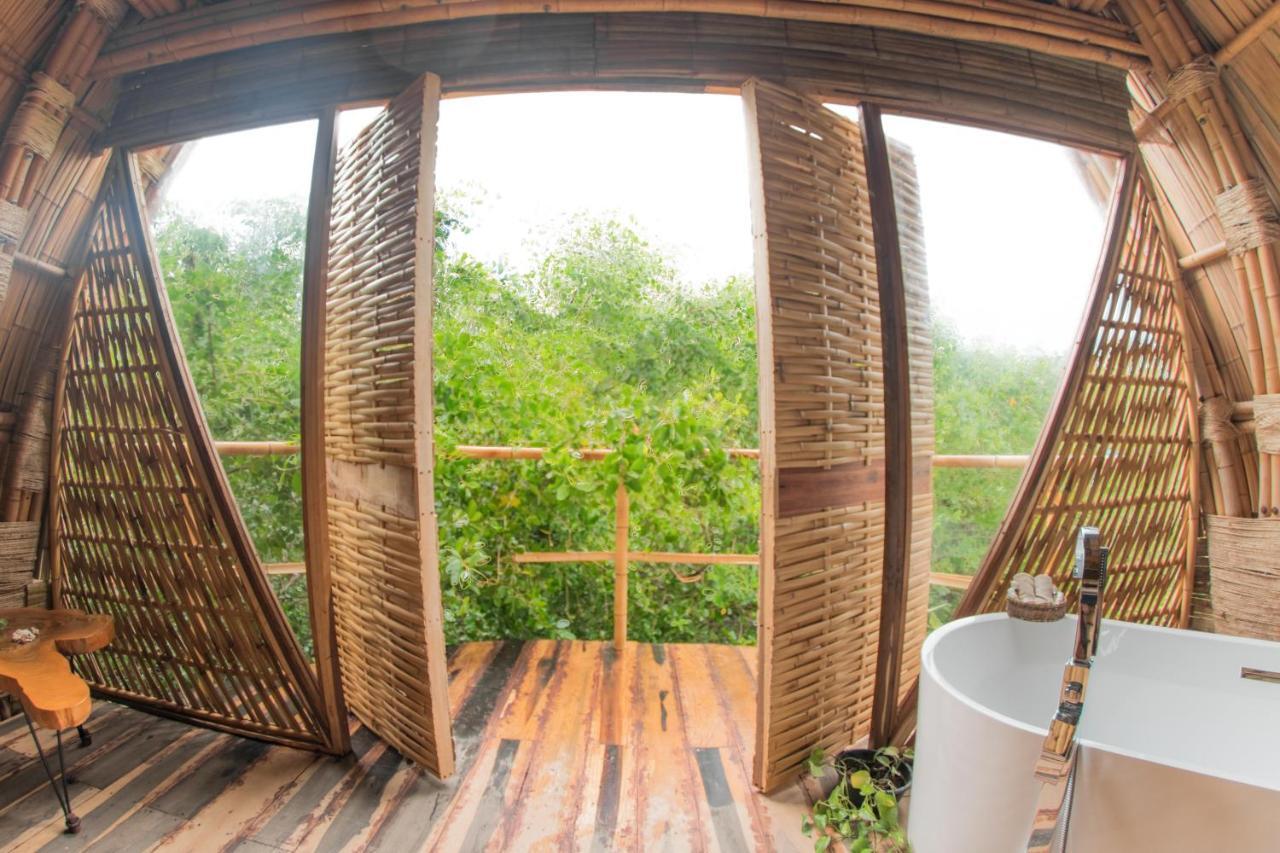 Mamasan Treehouses & Cabins ตูลุม ภายนอก รูปภาพ
